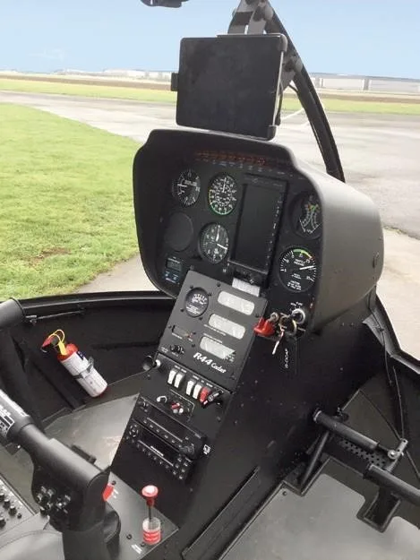 Cockpit and instrument panel of a 2018 ROBINSON R44 CADET.