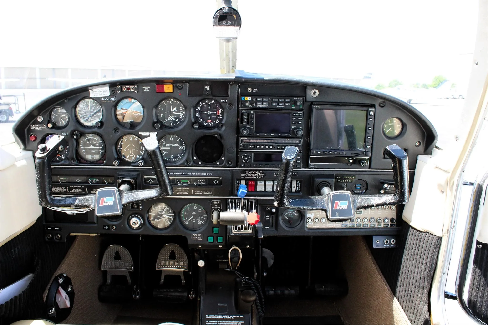 Cockpit and instrument panel of a 1969 PIPER ARROW.