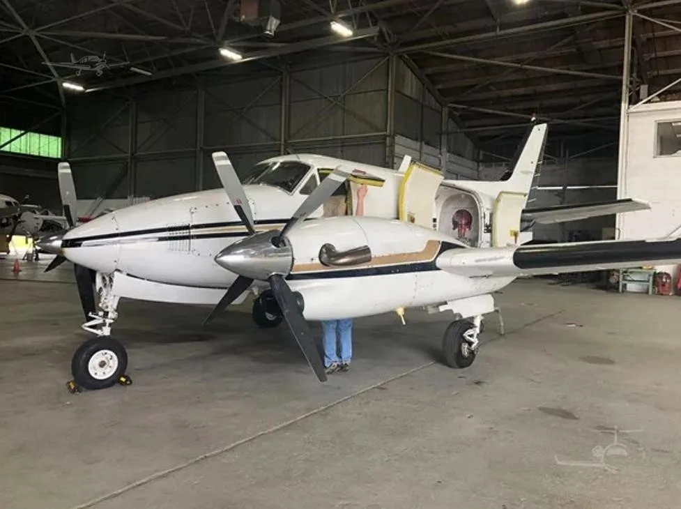Exterior view of a 1967 BEECHCRAFT KING AIR A90, N43JT.