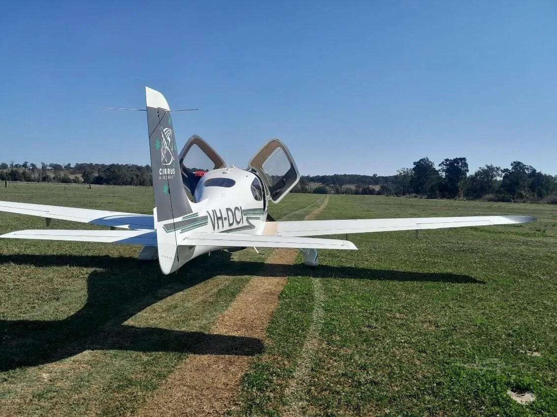 Exterior view of a 2002 CIRRUS SR22, VH-DCI.
