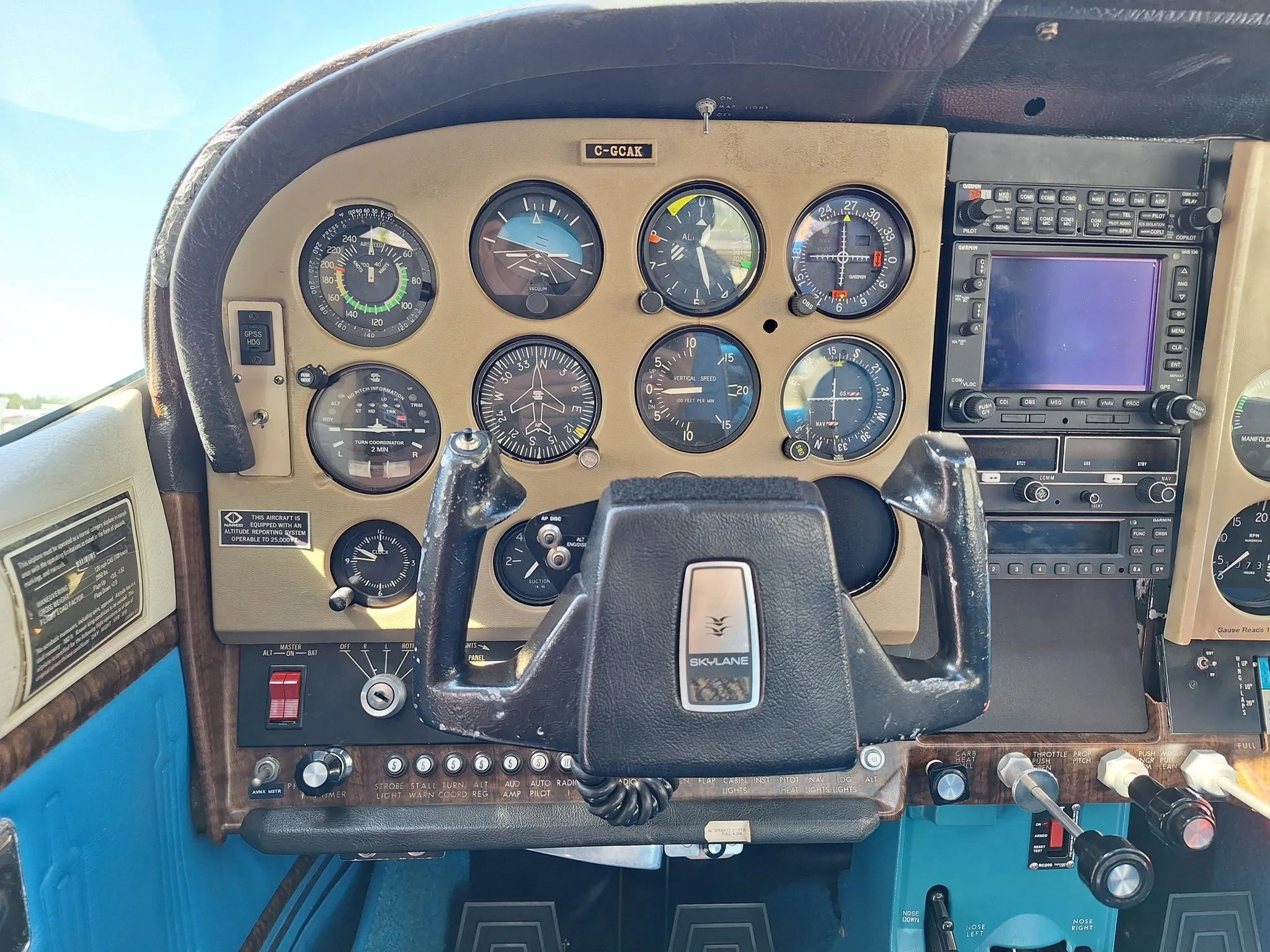 Cockpit and instrument panel of a 1974 CESSNA 182P SKYLANE.