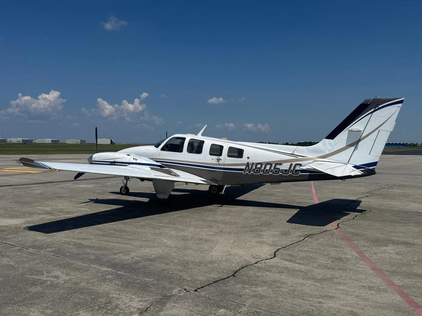 Exterior view of a 1980 BEECHCRAFT 58P BARON, N805JC.