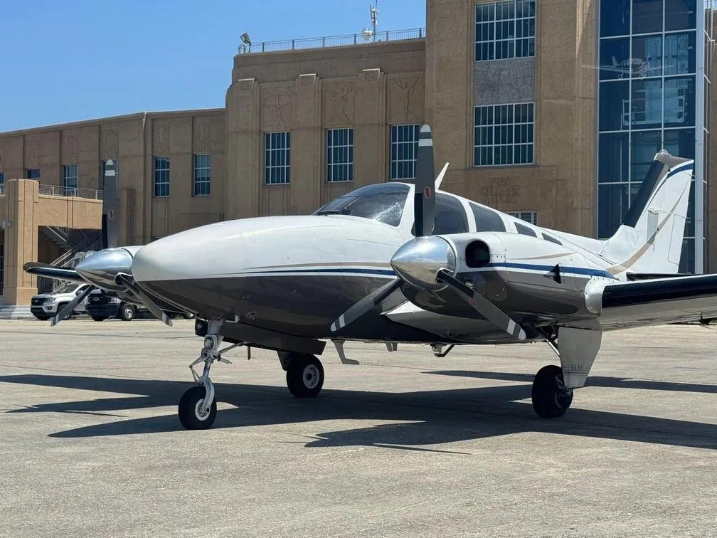 Exterior view of a 1980 BEECHCRAFT 58P BARON, N805JC.