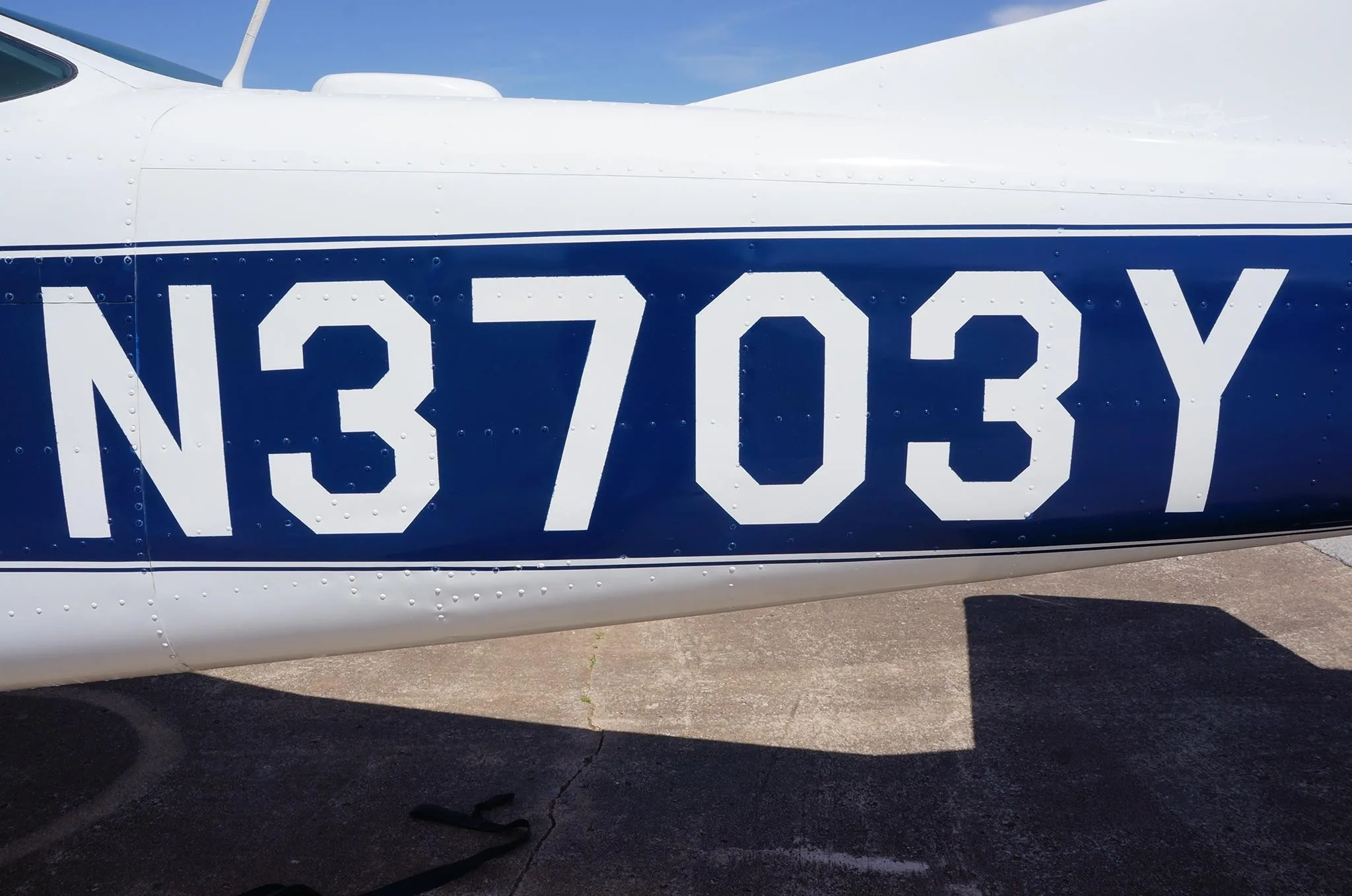 Exterior view of a 1963 CESSNA 210, N3703Y.
