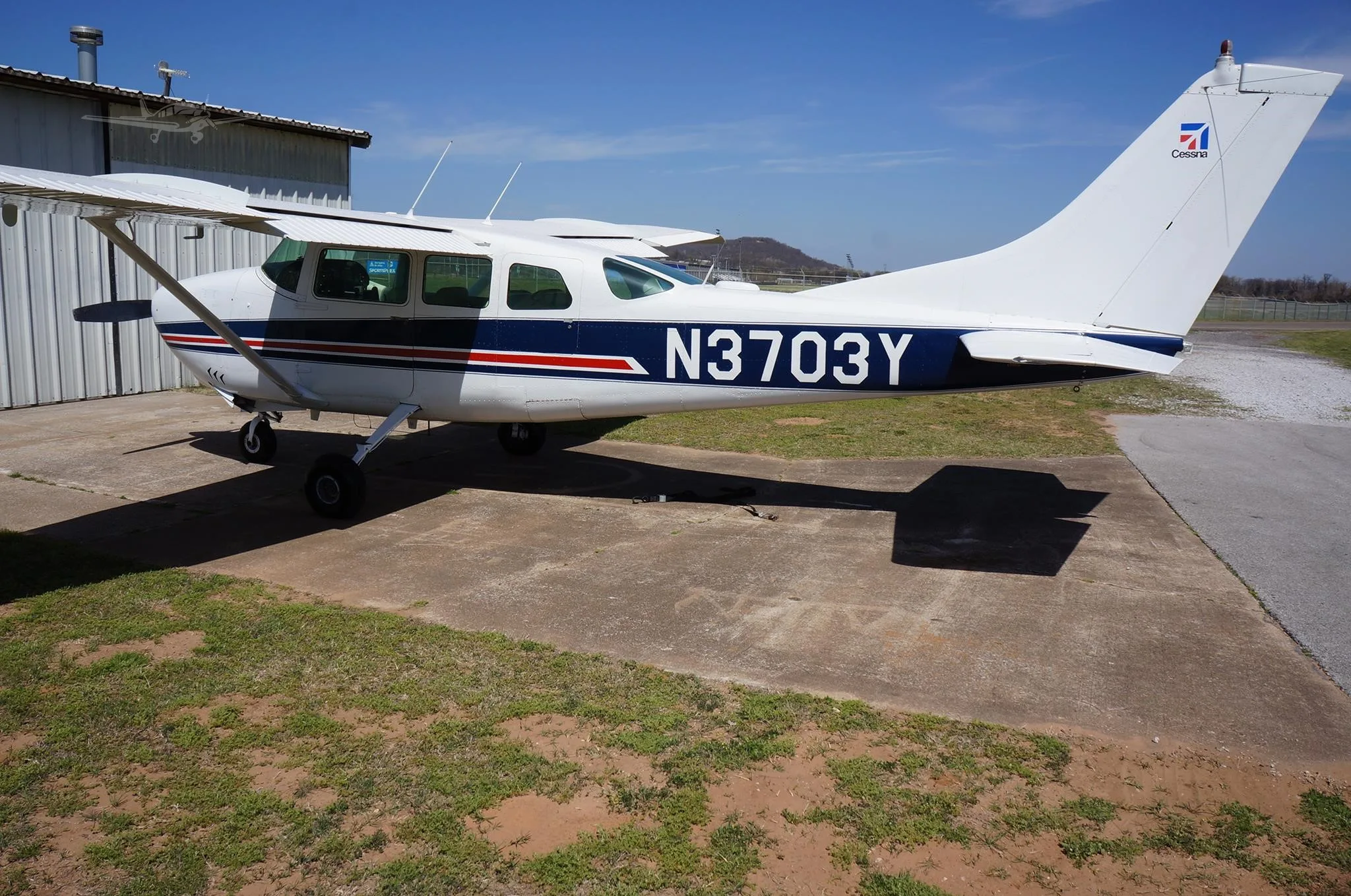 Exterior view of a 1963 CESSNA 210, N3703Y.