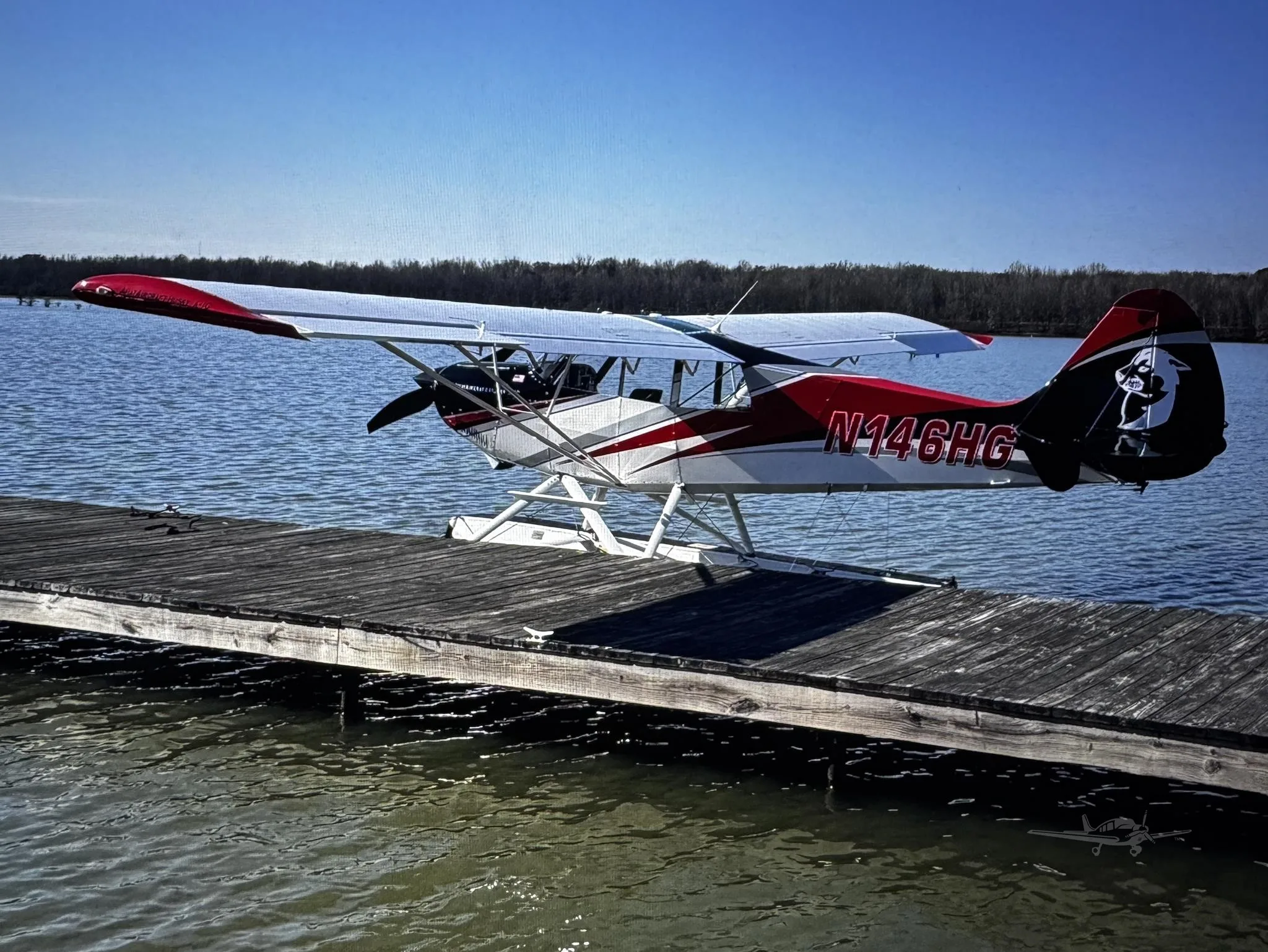 Exterior view of a 2012 AVIAT HUSKY A-1C-200, N146HG.