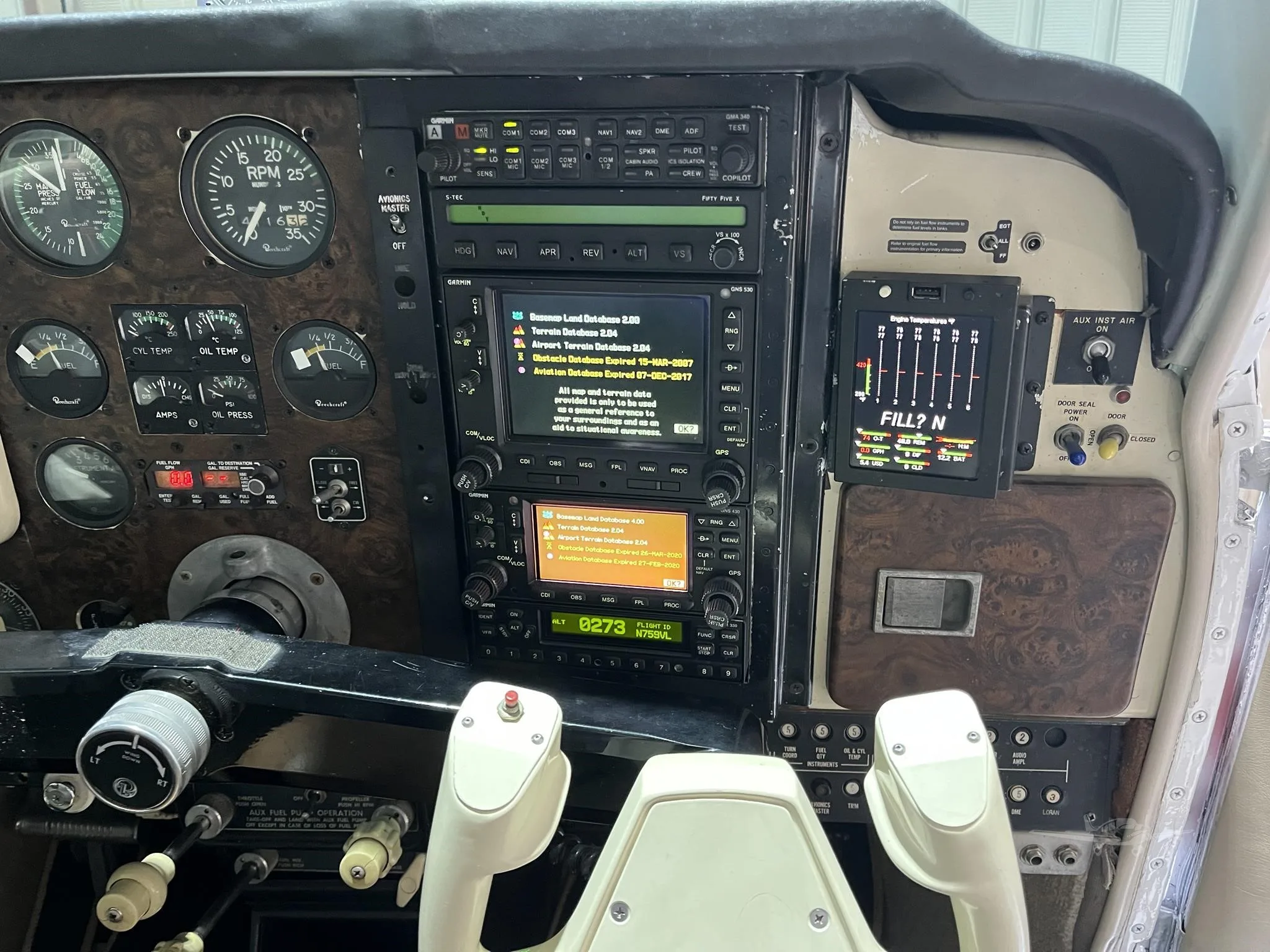 Cockpit and instrument panel of a 1977 BEECHCRAFT A36 BONANZA.