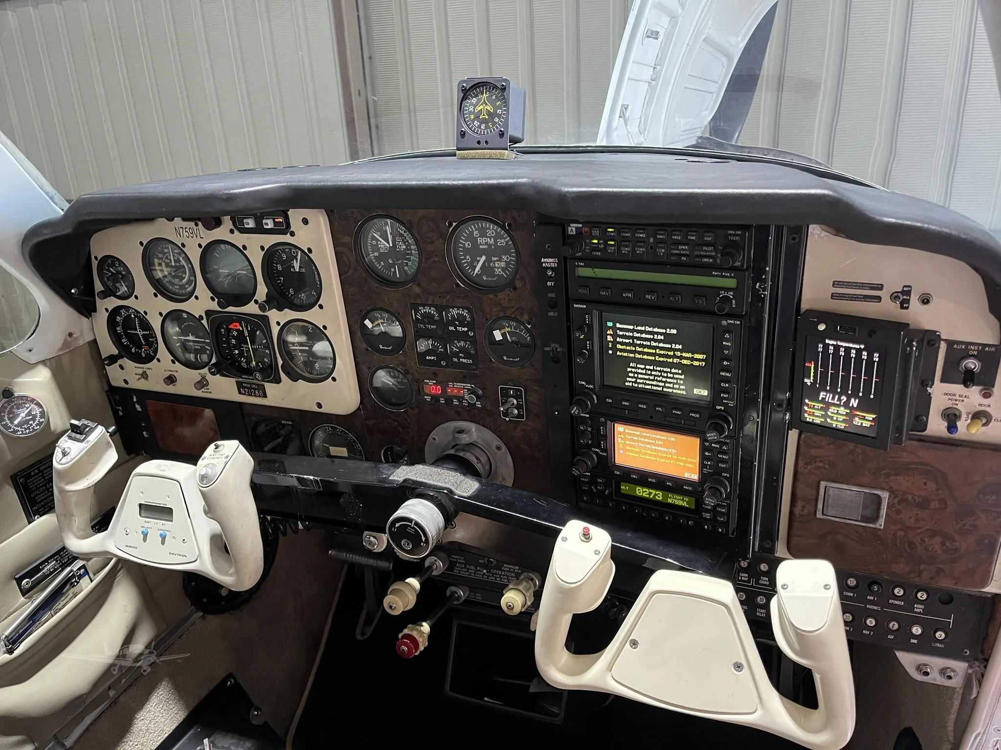 Cockpit and instrument panel of a 1977 BEECHCRAFT A36 BONANZA.