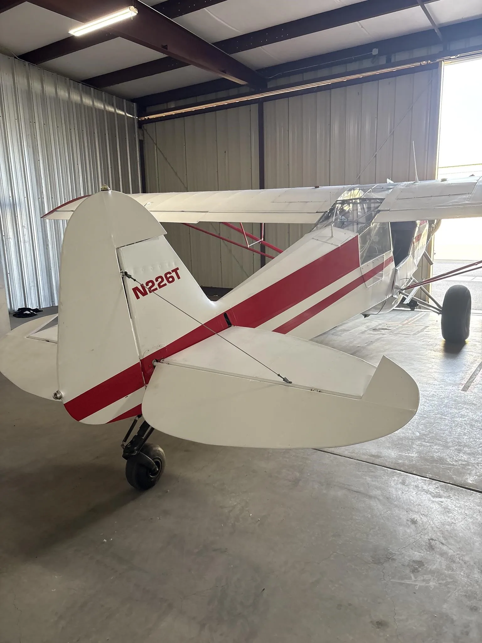 Exterior view of a 1953 PIPER SUPER CUB, N226T.