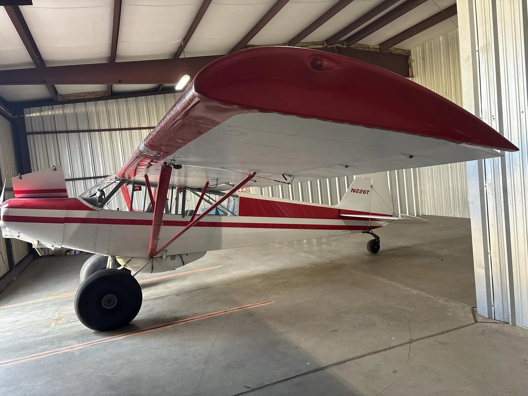 Exterior view of a 1953 PIPER SUPER CUB, N226T.