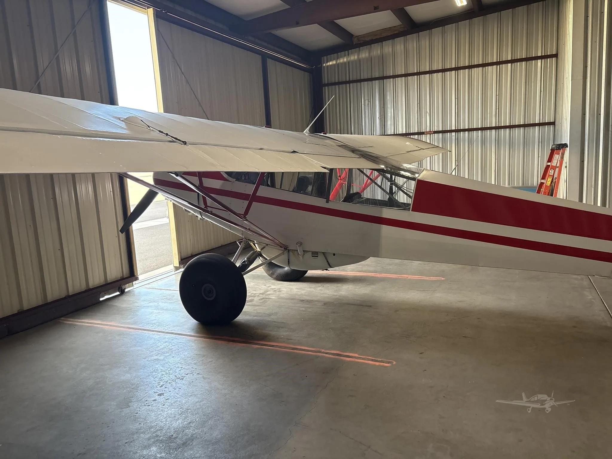 Exterior view of a 1953 PIPER SUPER CUB, N226T.