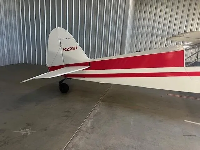 Exterior view of a 1953 PIPER SUPER CUB, N226T.