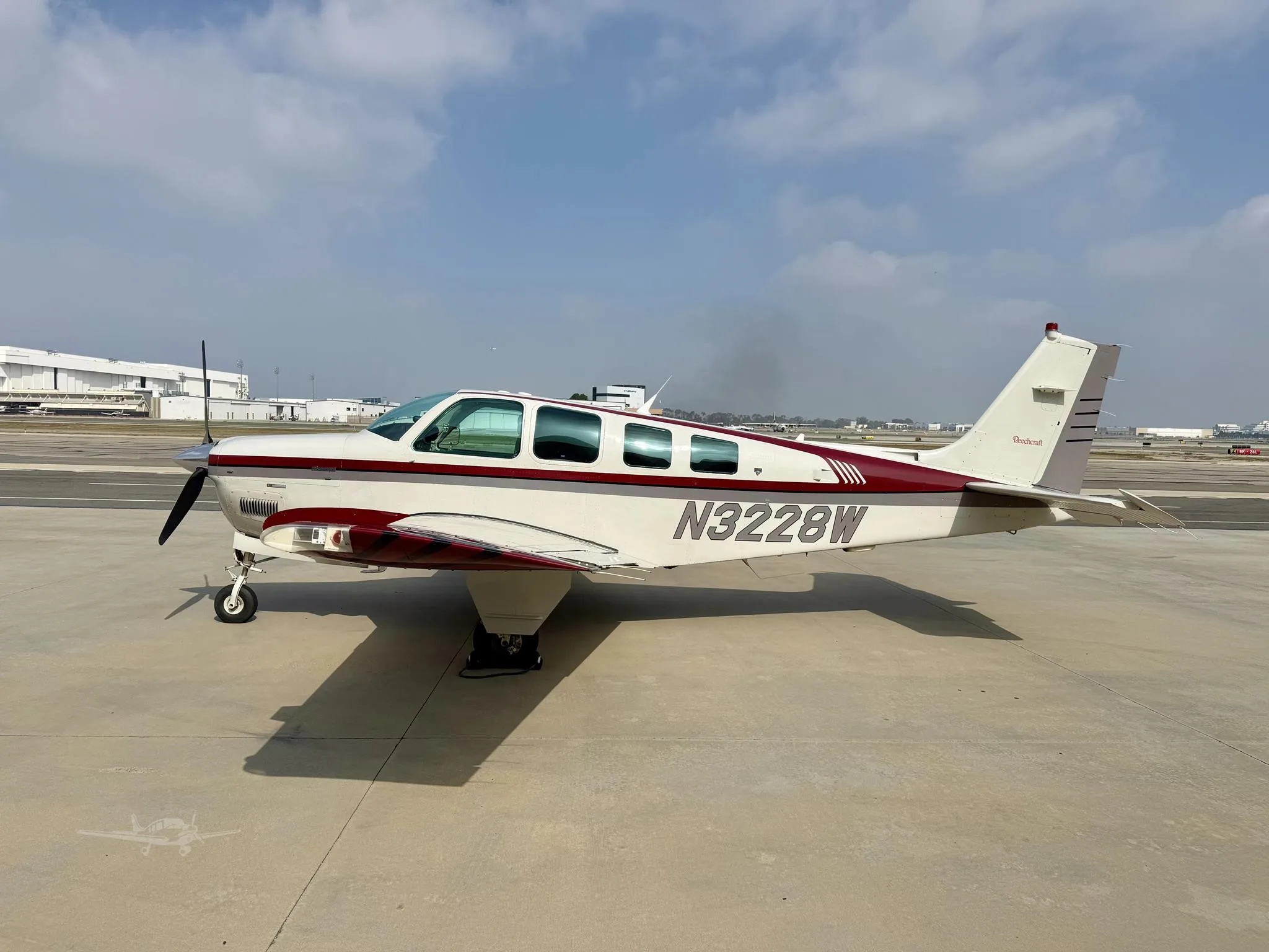 Exterior view of a 1995 BEECHCRAFT A36 BONANZA, N3228W.
