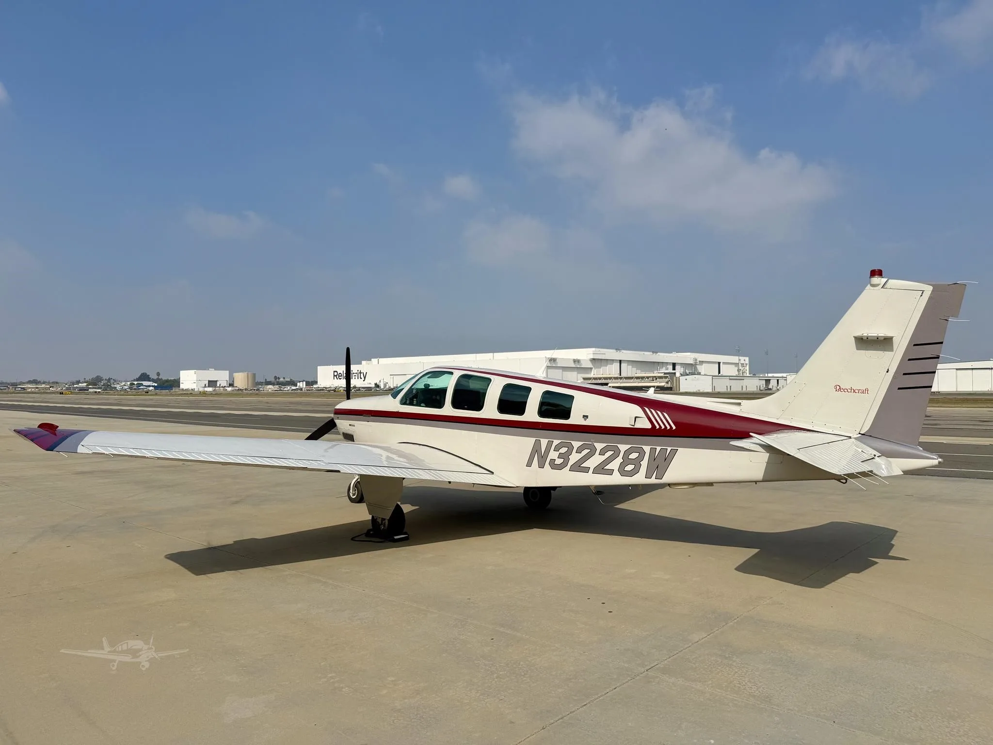 Exterior view of a 1995 BEECHCRAFT A36 BONANZA, N3228W.