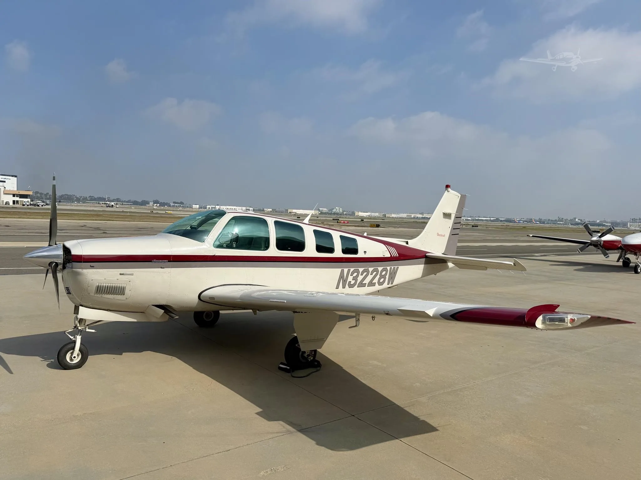 Exterior view of a 1995 BEECHCRAFT A36 BONANZA, N3228W.