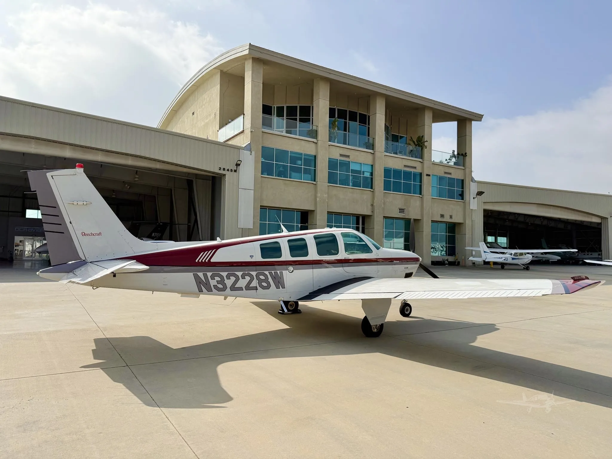 Exterior view of a 1995 BEECHCRAFT A36 BONANZA, N3228W.