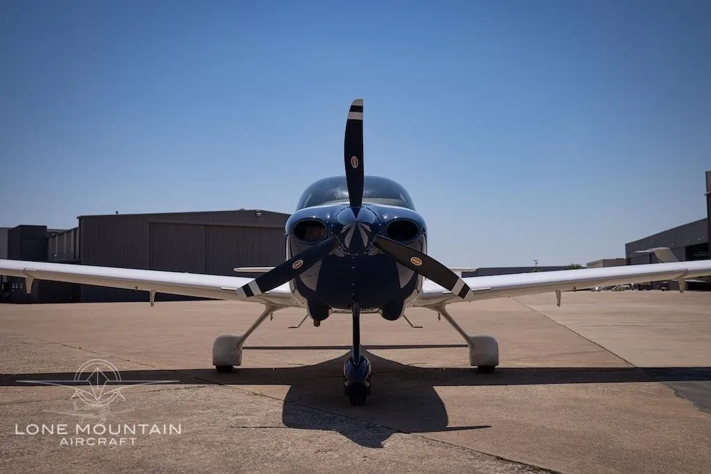 Exterior view of a 2021 CIRRUS SR20-G6, N221TR.