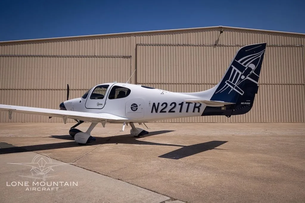 Exterior view of a 2021 CIRRUS SR20-G6, N221TR.