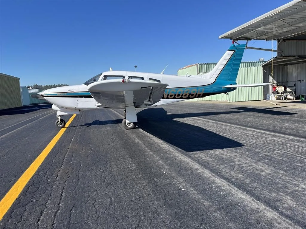 Exterior view of a 1978 PIPER TURBO ARROW III, N6089H.