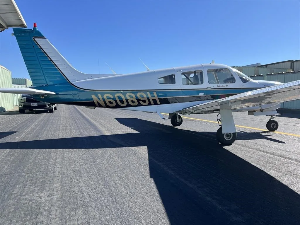 Exterior view of a 1978 PIPER TURBO ARROW III, N6089H.