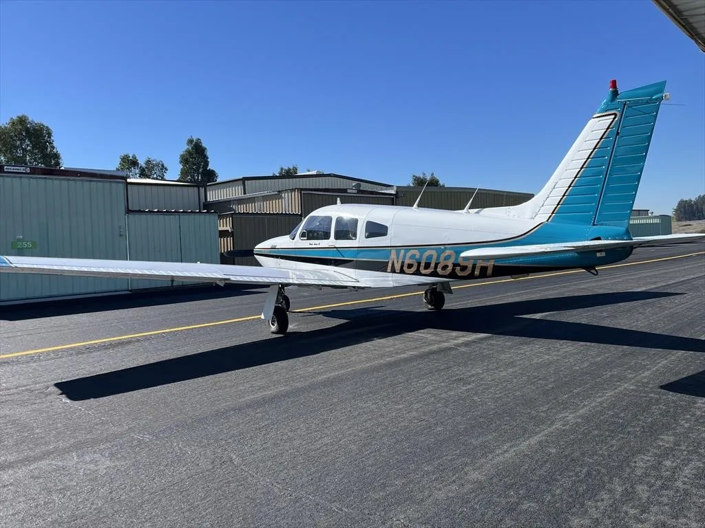 Exterior view of a 1978 PIPER TURBO ARROW III, N6089H.