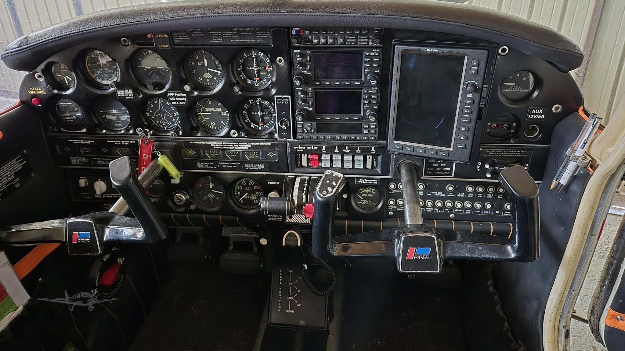 Cockpit and instrument panel of a 1974 PIPER CHEROKEE 180.
