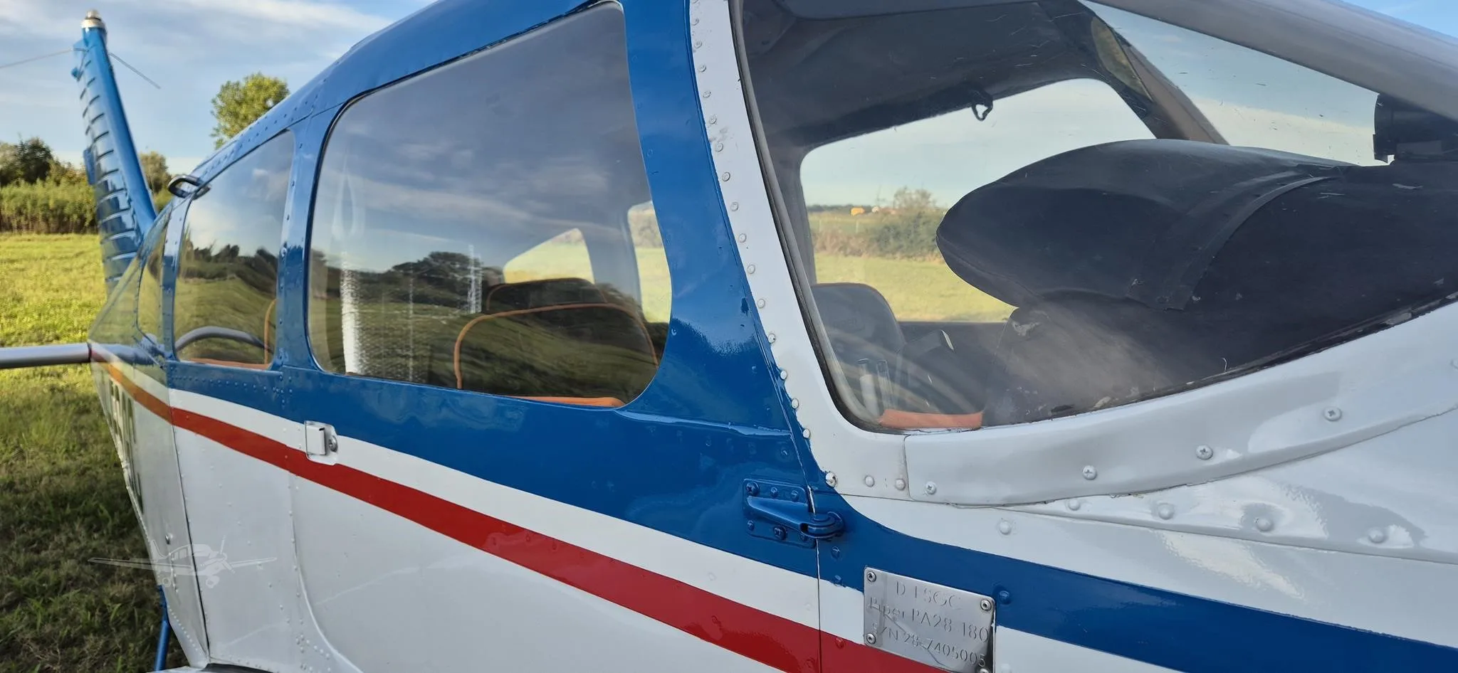 Exterior view of a 1974 PIPER CHEROKEE 180, D-ESGC.