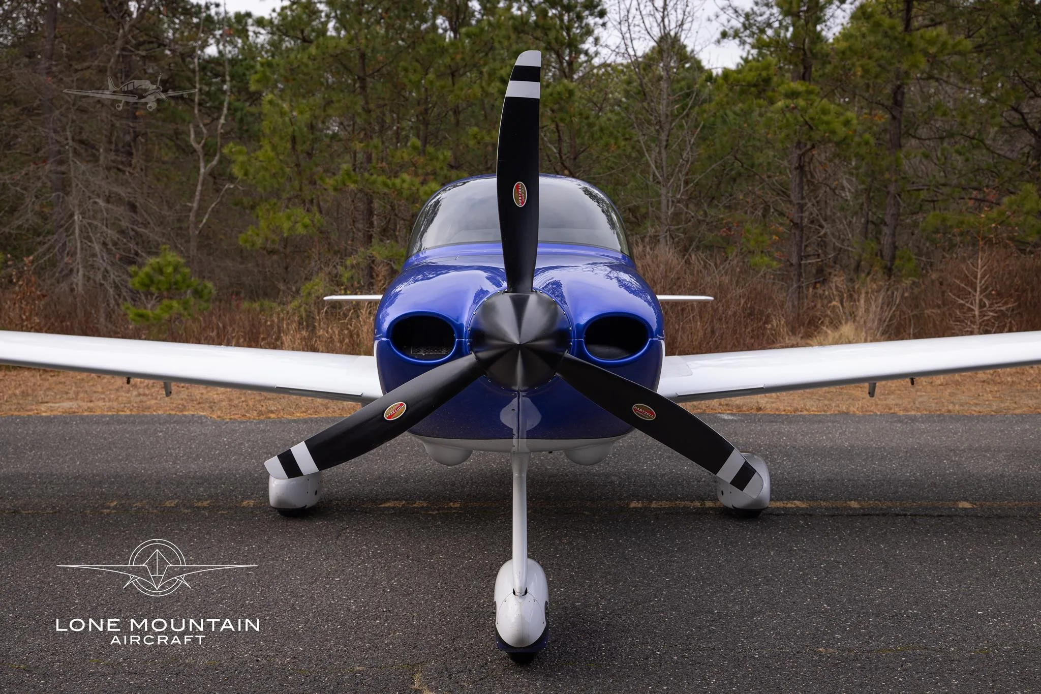 Exterior view of a 2024 CIRRUS SR20-G7, N32EF.