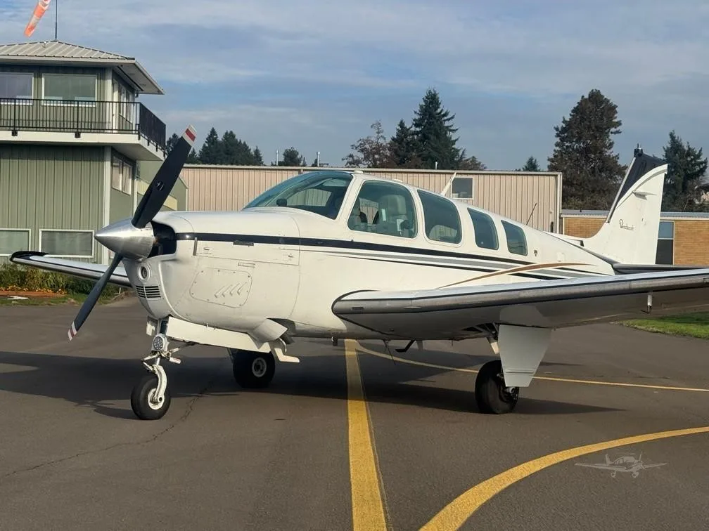 Exterior view of a 1980 BEECHCRAFT A36 BONANZA, N523AM.
