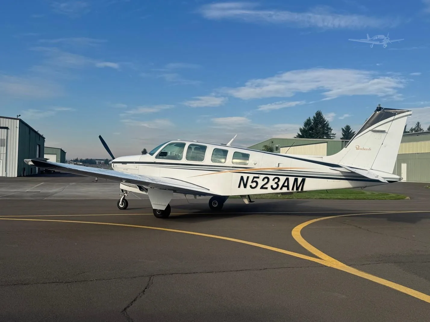 Exterior view of a 1980 BEECHCRAFT A36 BONANZA, N523AM.