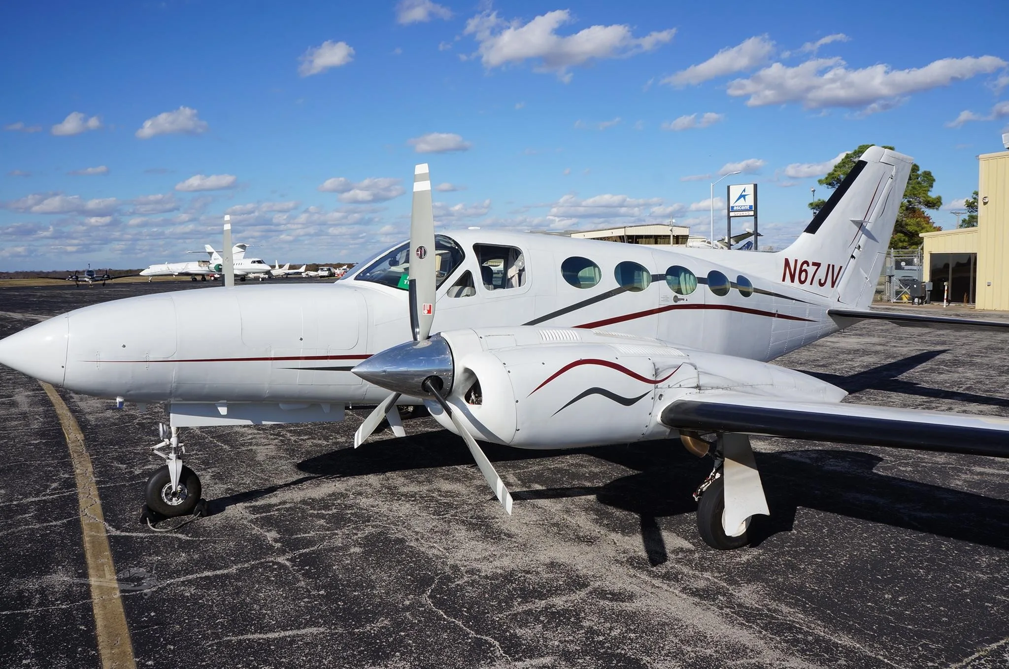 Exterior view of a 1978 CESSNA 421C, N67JV.