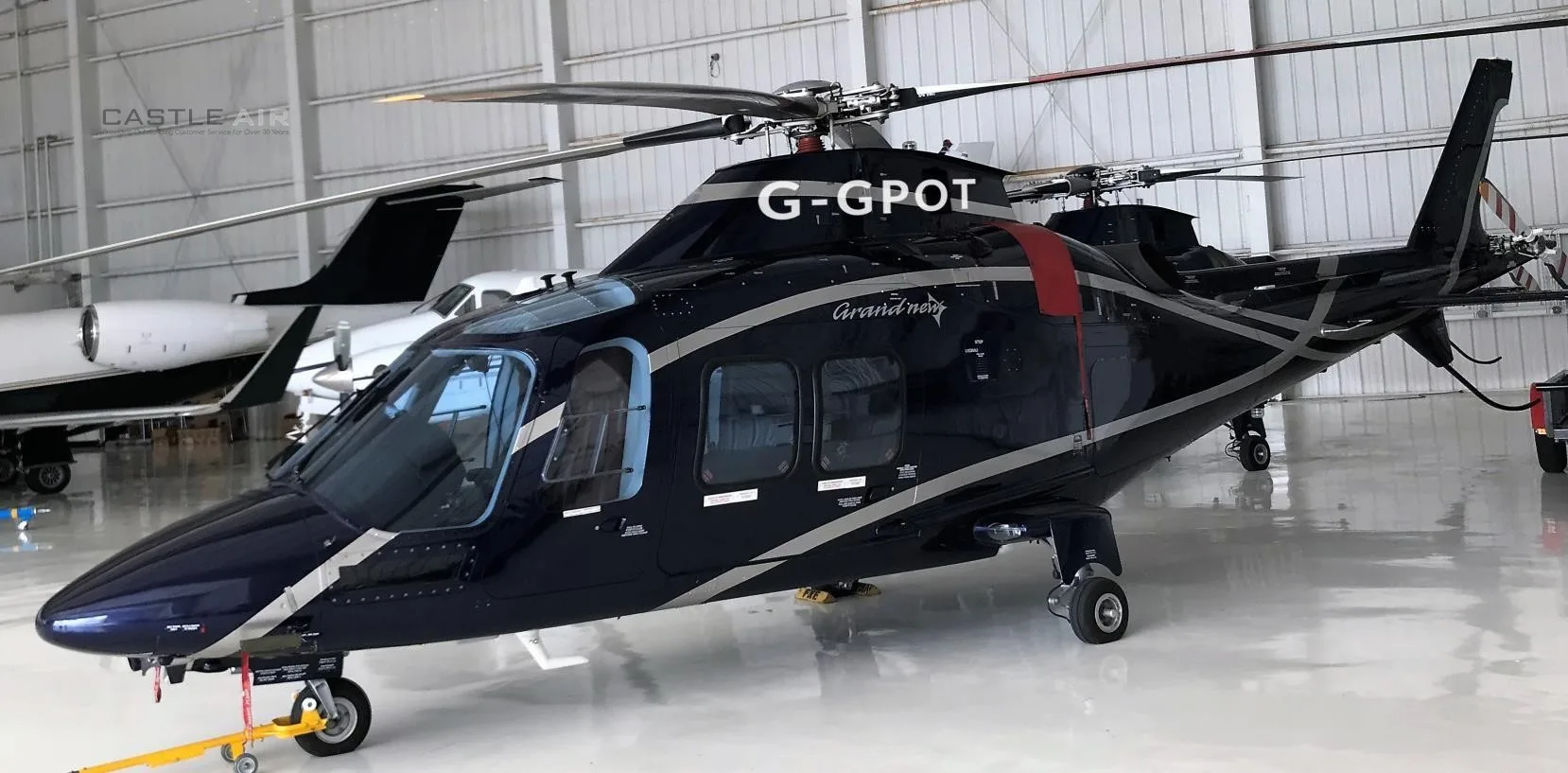 Exterior view of a 2012 LEONARDO AW109SP GRANDNEW.