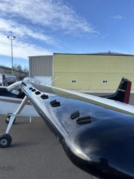 Exterior view of a 1967 CESSNA 180, N614JD.