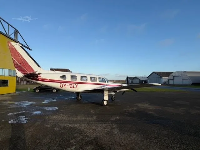 Exterior view of a 1968 PIPER NAVAJO, OY-DLY.
