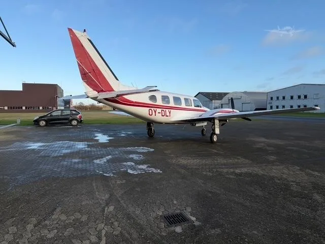 Exterior view of a 1968 PIPER NAVAJO, OY-DLY.