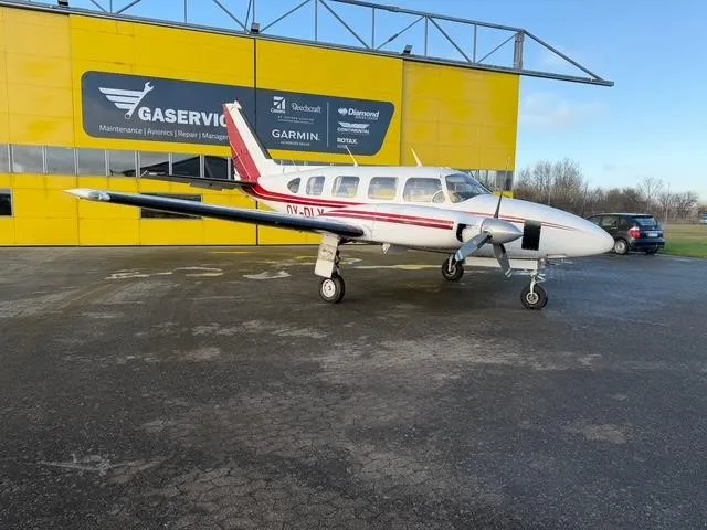 Exterior view of a 1968 PIPER NAVAJO, OY-DLY.