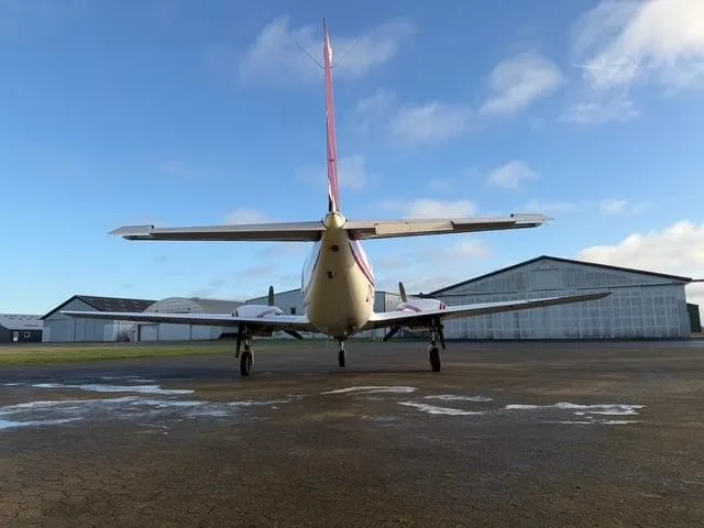 Exterior view of a 1968 PIPER NAVAJO, OY-DLY.