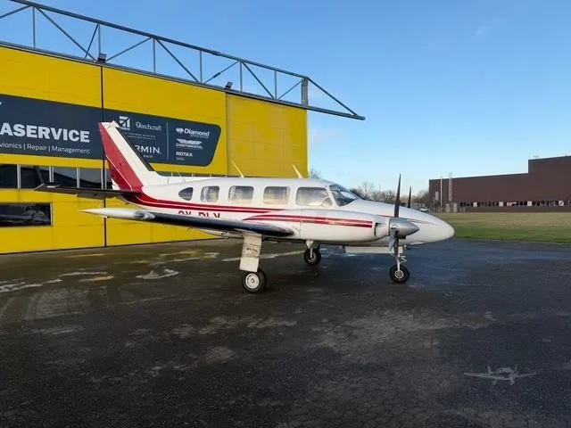 Exterior view of a 1968 PIPER NAVAJO, OY-DLY.