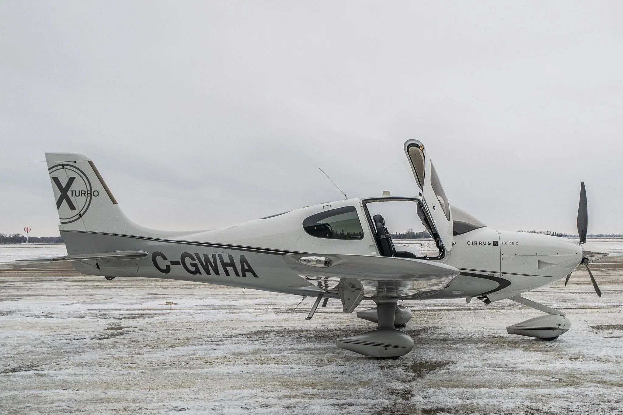 Exterior view of a 2011 CIRRUS SR22-G3 TURBO, C-GWHA.
