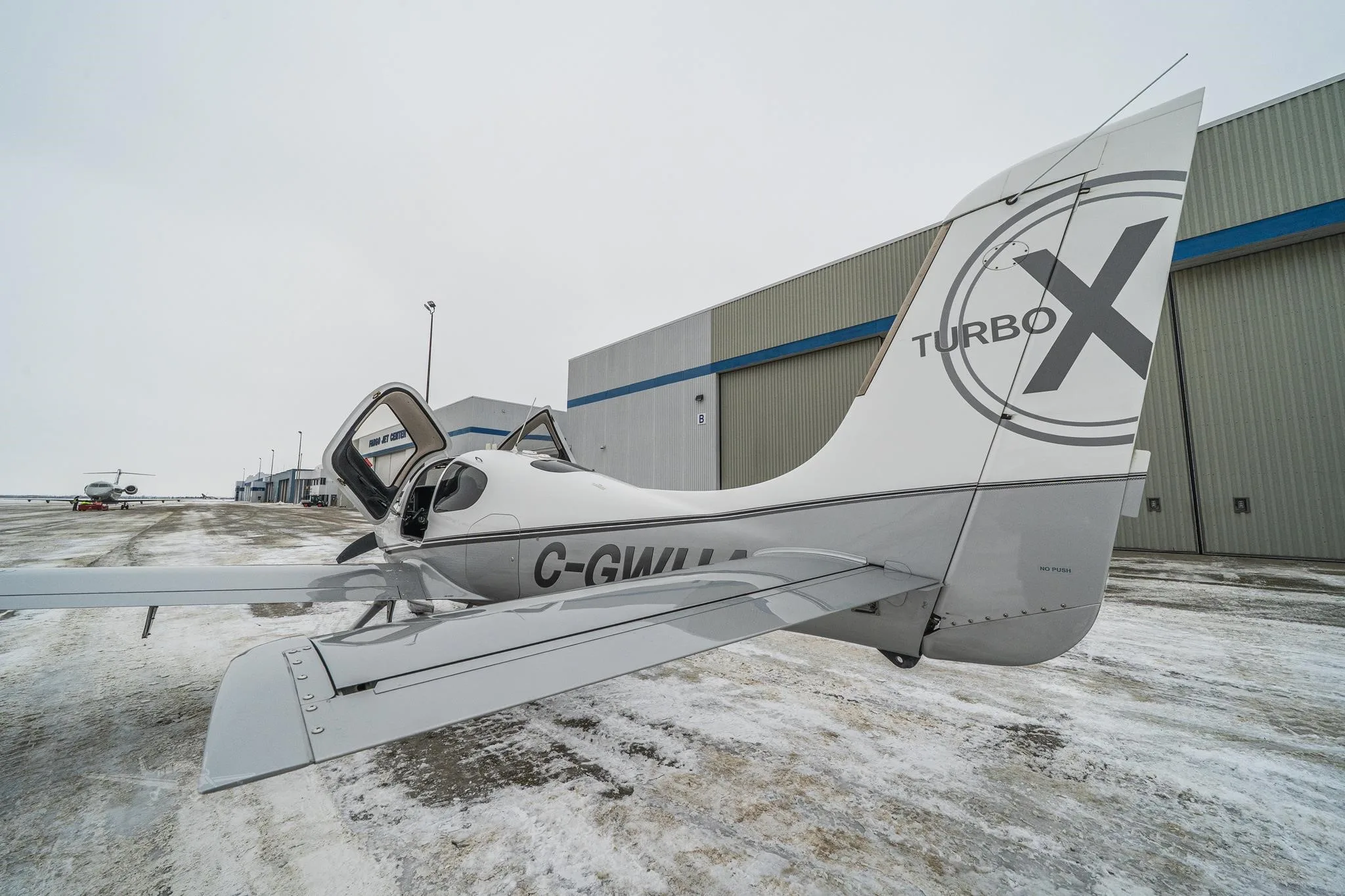Exterior view of a 2011 CIRRUS SR22-G3 TURBO, C-GWHA.