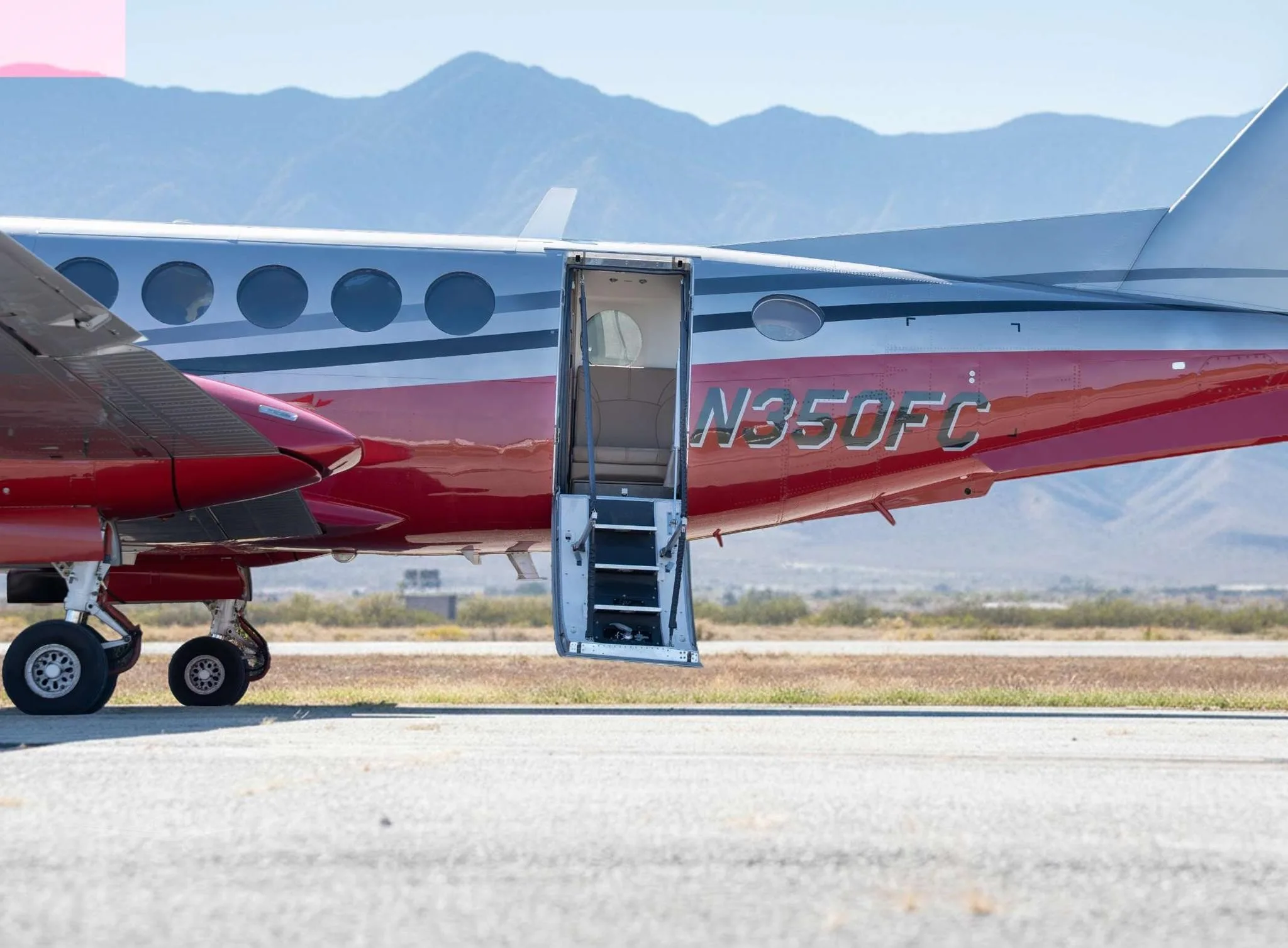 Exterior view of a 1998 BEECHCRAFT KING AIR 350, N350FC.