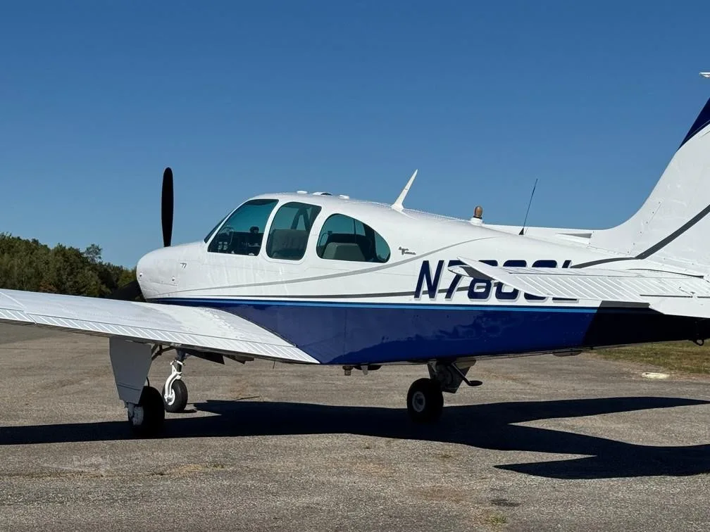 Exterior view of a 1966 BEECHCRAFT C33A DEBONAIR, N7880L.