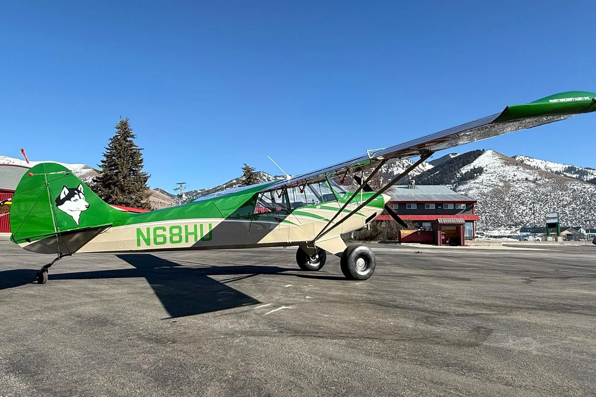 Exterior view of a 2026 AVIAT HUSKY A-1C-180, N68HU.