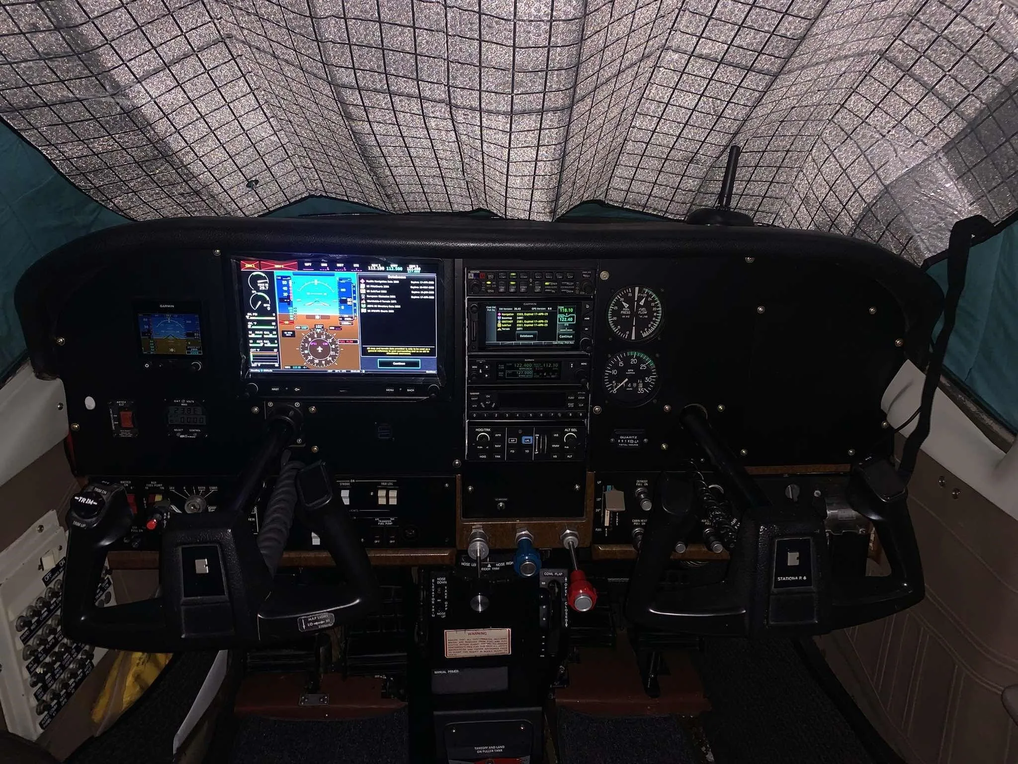 Cockpit and instrument panel of a 1982 CESSNA U206G STATIONAIR.