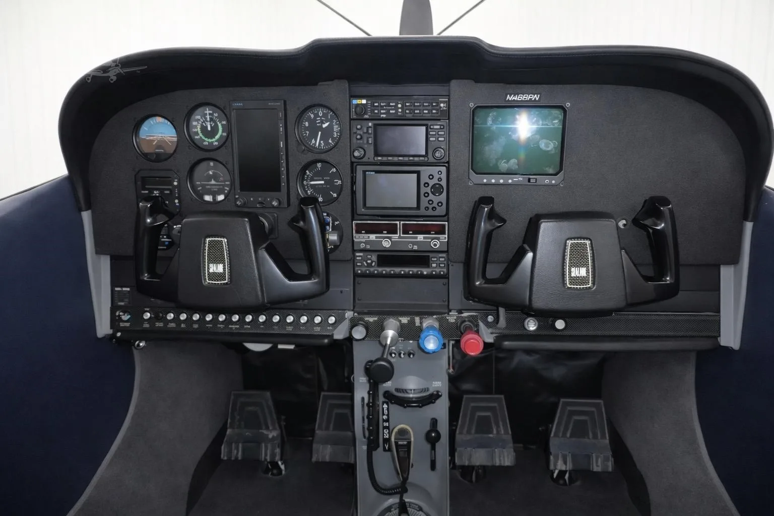 Cockpit and instrument panel of a 1973 CESSNA 182P SKYLANE.