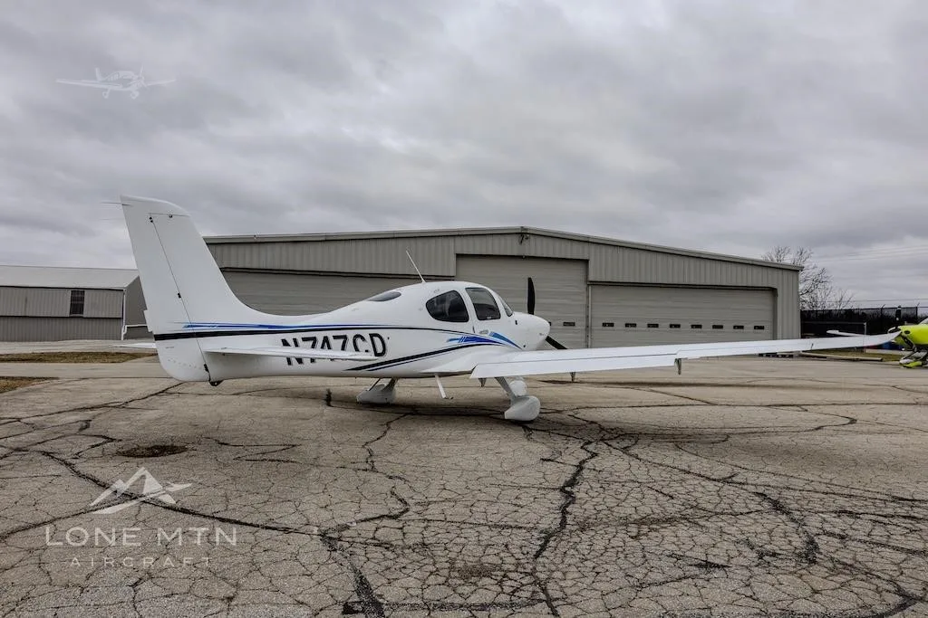 Exterior view of a 2023 CIRRUS SR20-G6, N747CD.