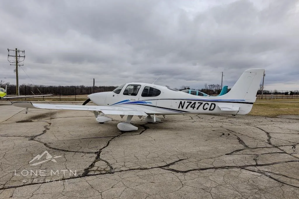 Exterior view of a 2023 CIRRUS SR20-G6, N747CD.
