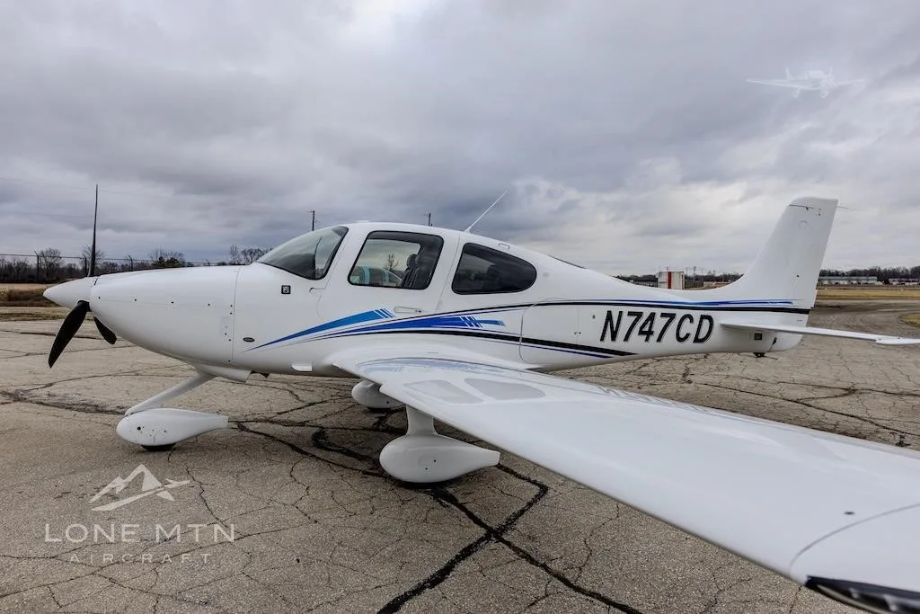 Exterior view of a 2023 CIRRUS SR20-G6, N747CD.