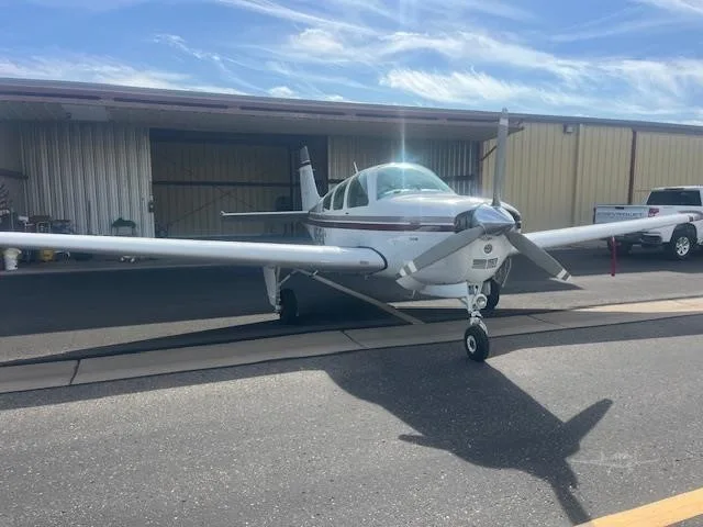Exterior view of a 1990 BEECHCRAFT F33A BONANZA, N15454.