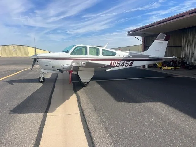 Exterior view of a 1990 BEECHCRAFT F33A BONANZA, N15454.